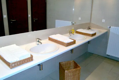 Commercial bathroom plumbing maintained by Rose Plumbing